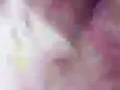 Sexy busty Indian babe strips and masturbates in her bedroom.